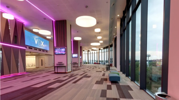 interior of the Vox, modern building, large windows, pink light