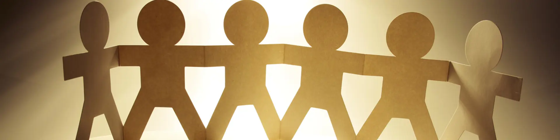 paper chain people in a row holding hands paper chain people in a row holding hands