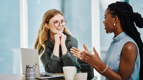 Two women deep in discussion Two women deep in discussion