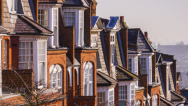 red brick houses, a distant skyline